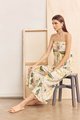 Model wearing Flores Printed Wide Leg Jumpsuit in Ivory